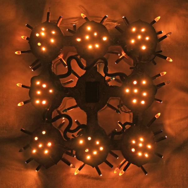 Sunset over the fence and ipomoea flowers Abstract Sculpture Tanbelia artist - Subjektiv.art