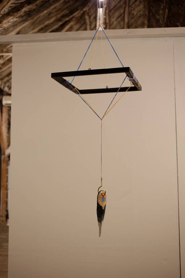 peacock skin hanging in the trees Sophie Vitovec - Subjektiv.art